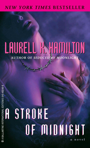 Cover image for A Stroke of Midnight by Laurell K. Hamilton.