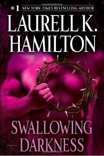 Cover image for Swallowing Darkness by Laurell K. Hamilton.