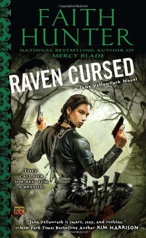 Cover image for Raven Cursed by Faith Hunter.