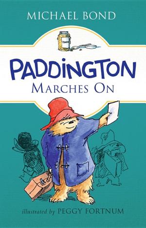 Cover image for Paddington Marches On by Michael Bond.